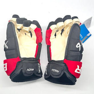 Bauer Supreme Mach - NHL Pro Stock Hockey Gloves - Michael Bunting (Black/Red)