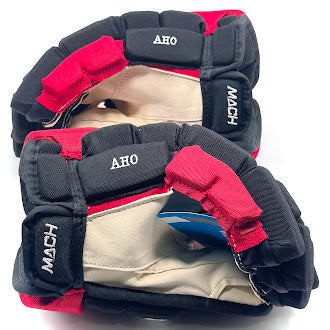 Bauer Supreme Mach - NHL Pro Stock Hockey Gloves - Sebastian Aho (Black/Red)